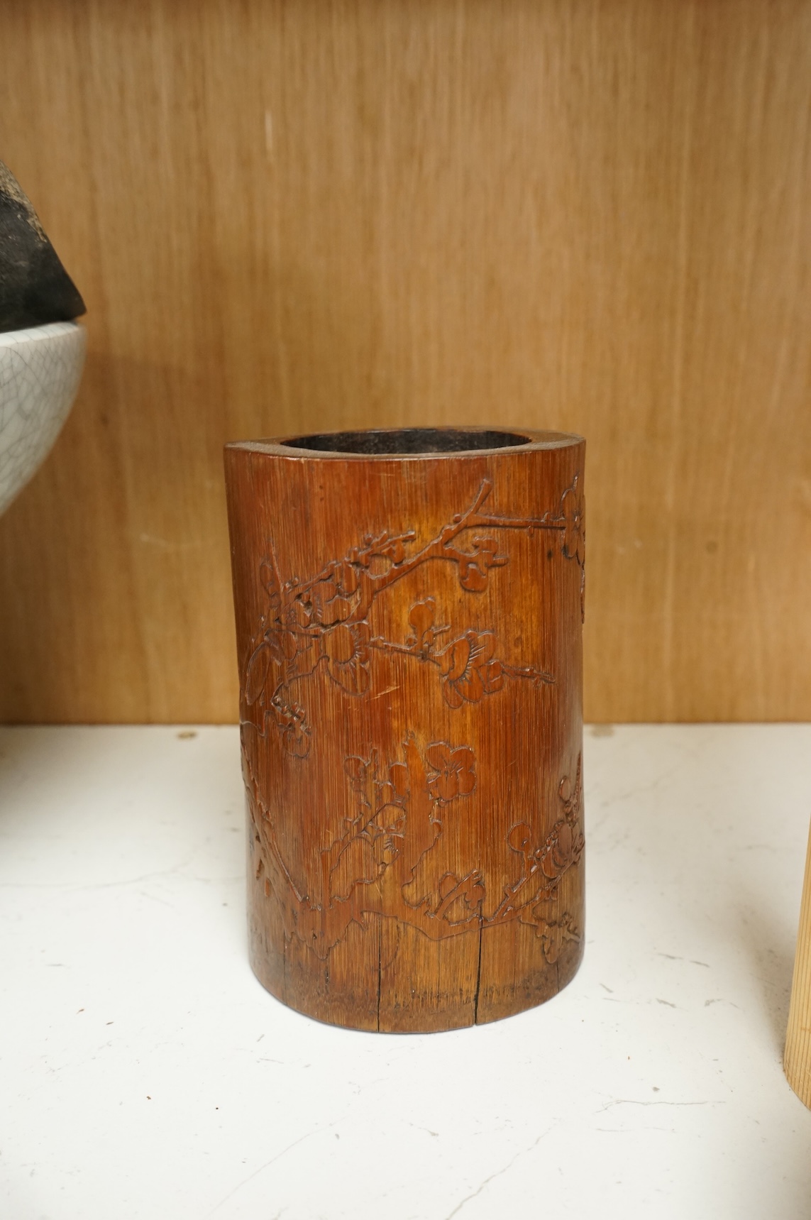 Oriental items to include a crackleglaze bowl on stand and a bamboo brush pot, together with two other vessels, largest 27cm in diameter